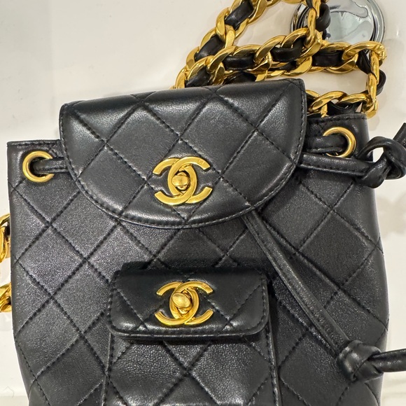 CHANEL Black and Gold Quilted Backpack with Iconic Design - Picture 2 of 6